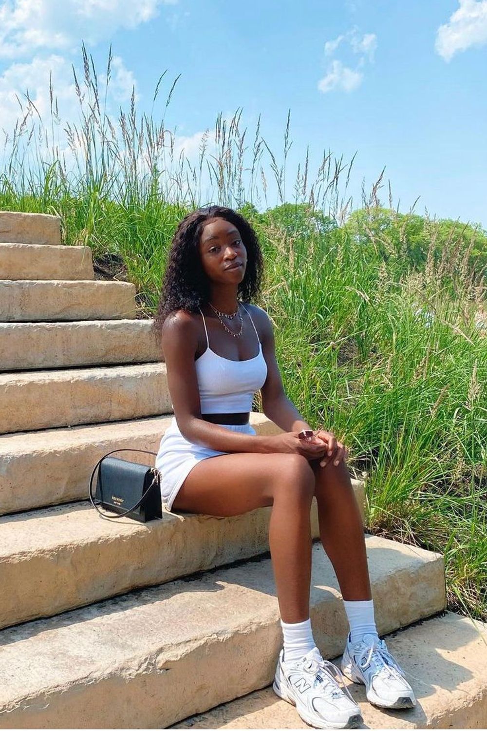 Tayetta's post featuring TNA, New Balance. Feeling loungewear, tna, aritzia, newbalance, dadsneakers, allwhiteoutfit, sweatshorts, comfycozy, casualfit