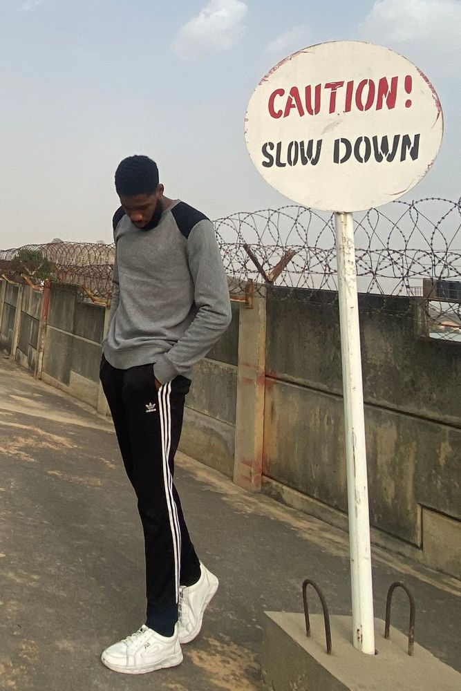 Iyke's fit featuring H&M, Adidas, Fila