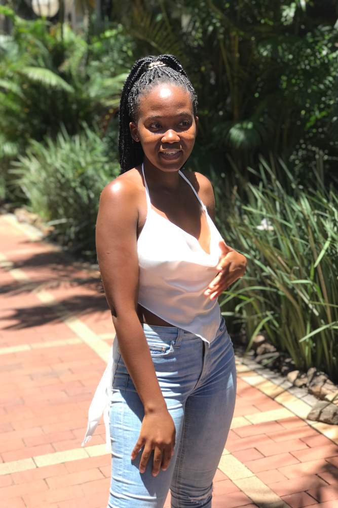 Mbaliza's review for SHEIN BAE Tie Backless Asymmetrical Hem Satin Halter Top