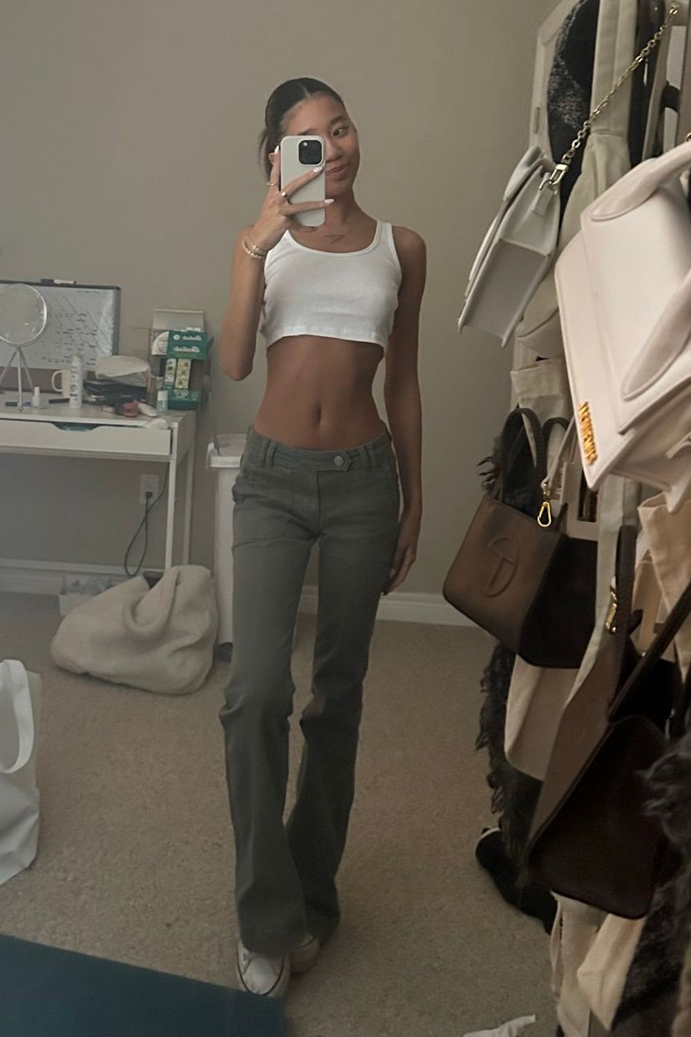 alyssattran's post featuring Garage, TNA, Converse. Feeling cute, streetwear, trendy, y2k, chic, simple, flare, lowrise