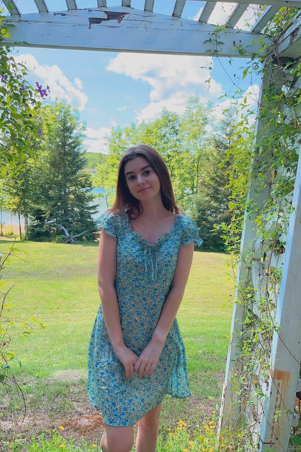 Post featuring The Ruffle Edge Floral Mini Dress