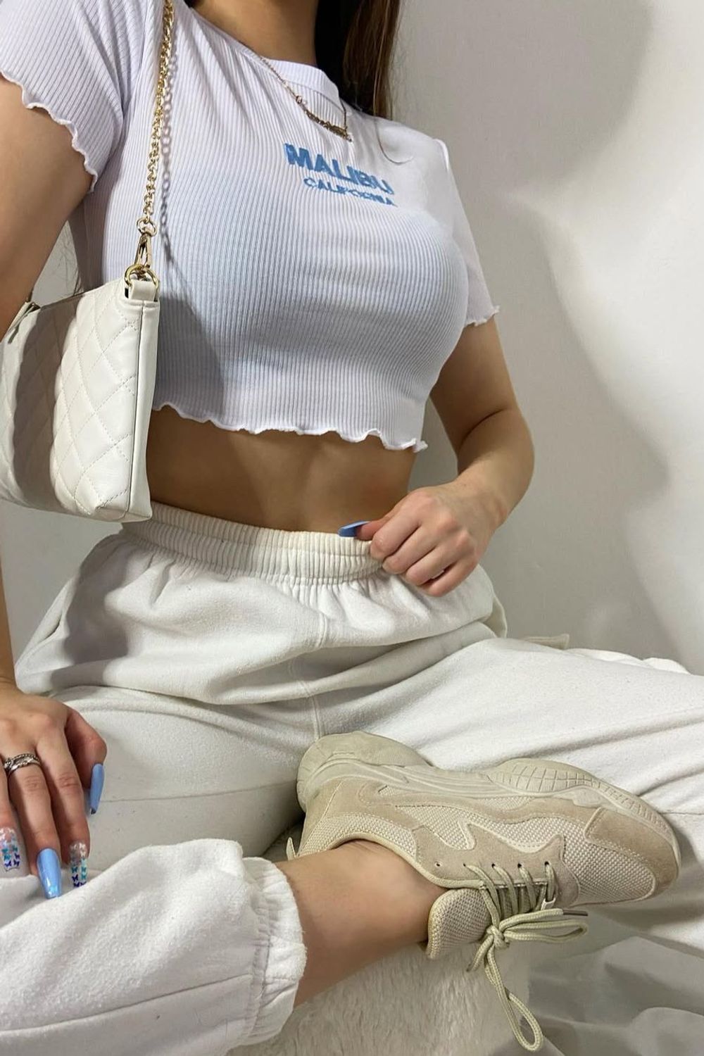 Post featuring Veronika Malibu Embroidered Rib Crop Top In Black