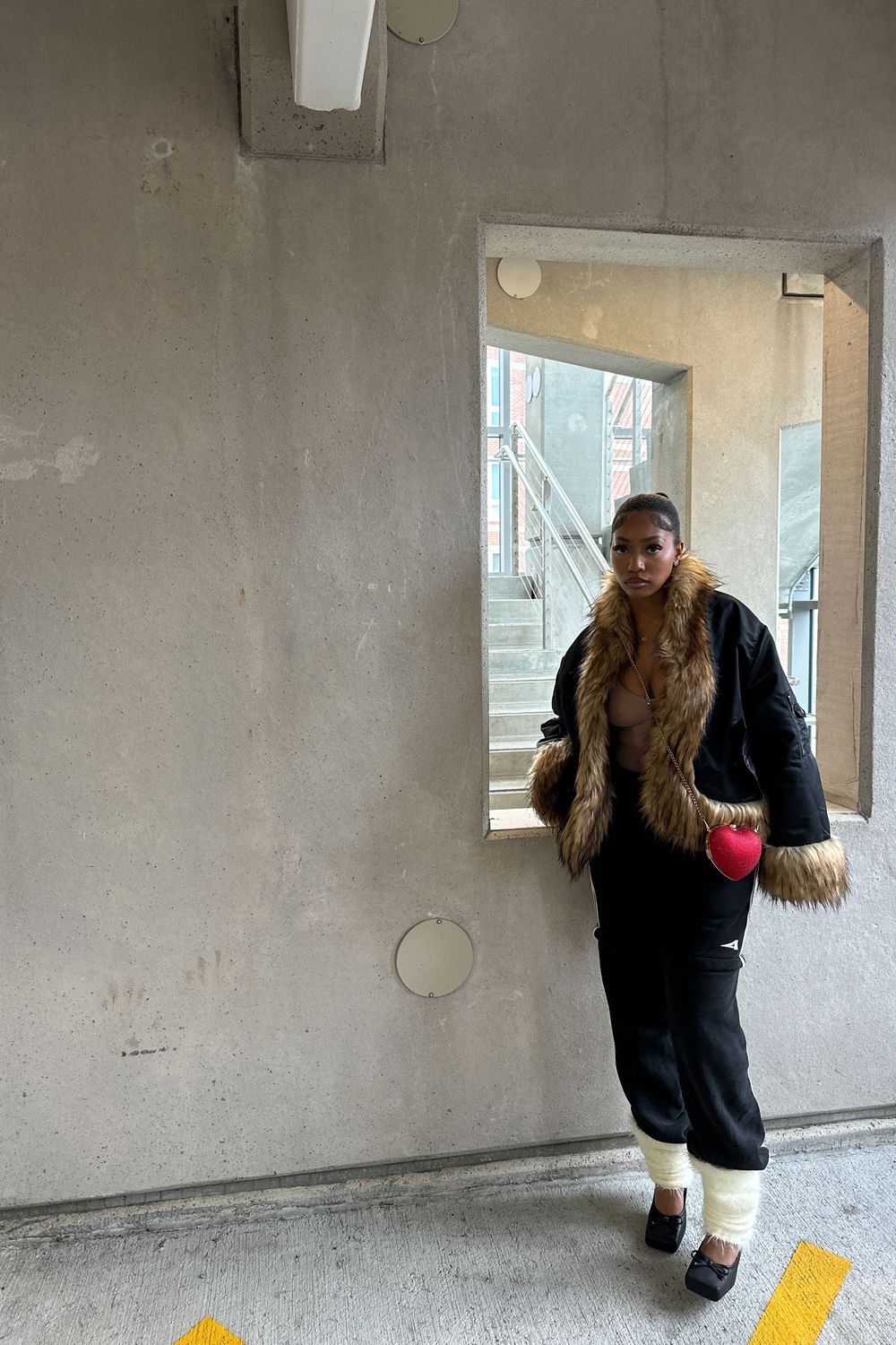 Post featuring Evren Faux Fur Bomber Jacket in Black