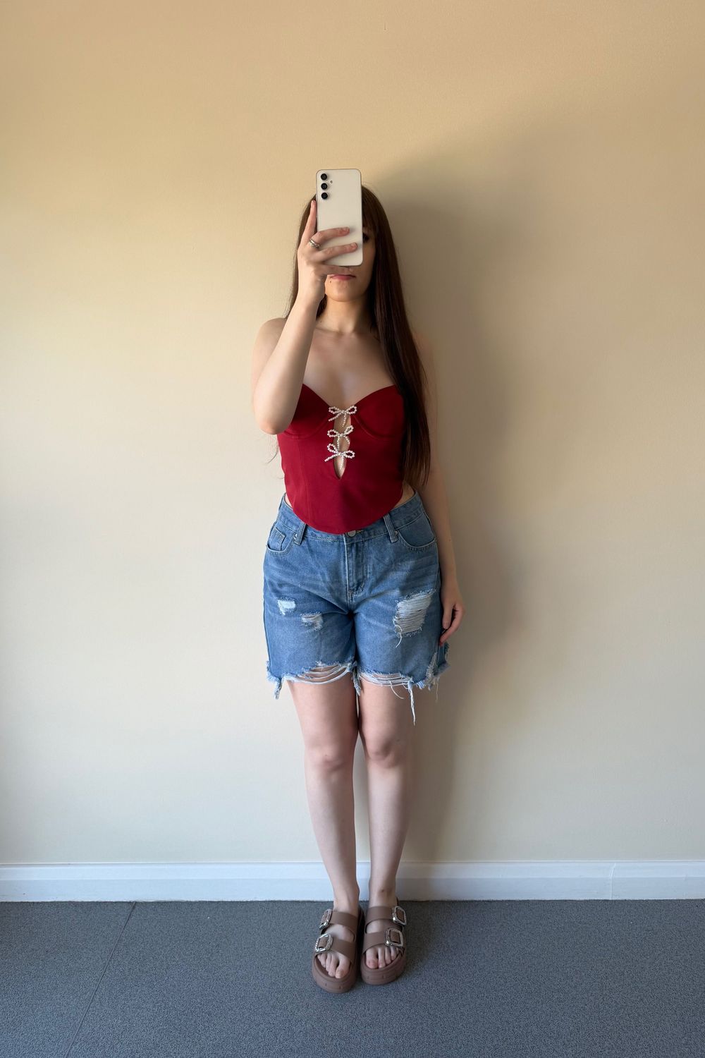 Post featuring Cut-Out Bow-Detail Corset Top in True Red