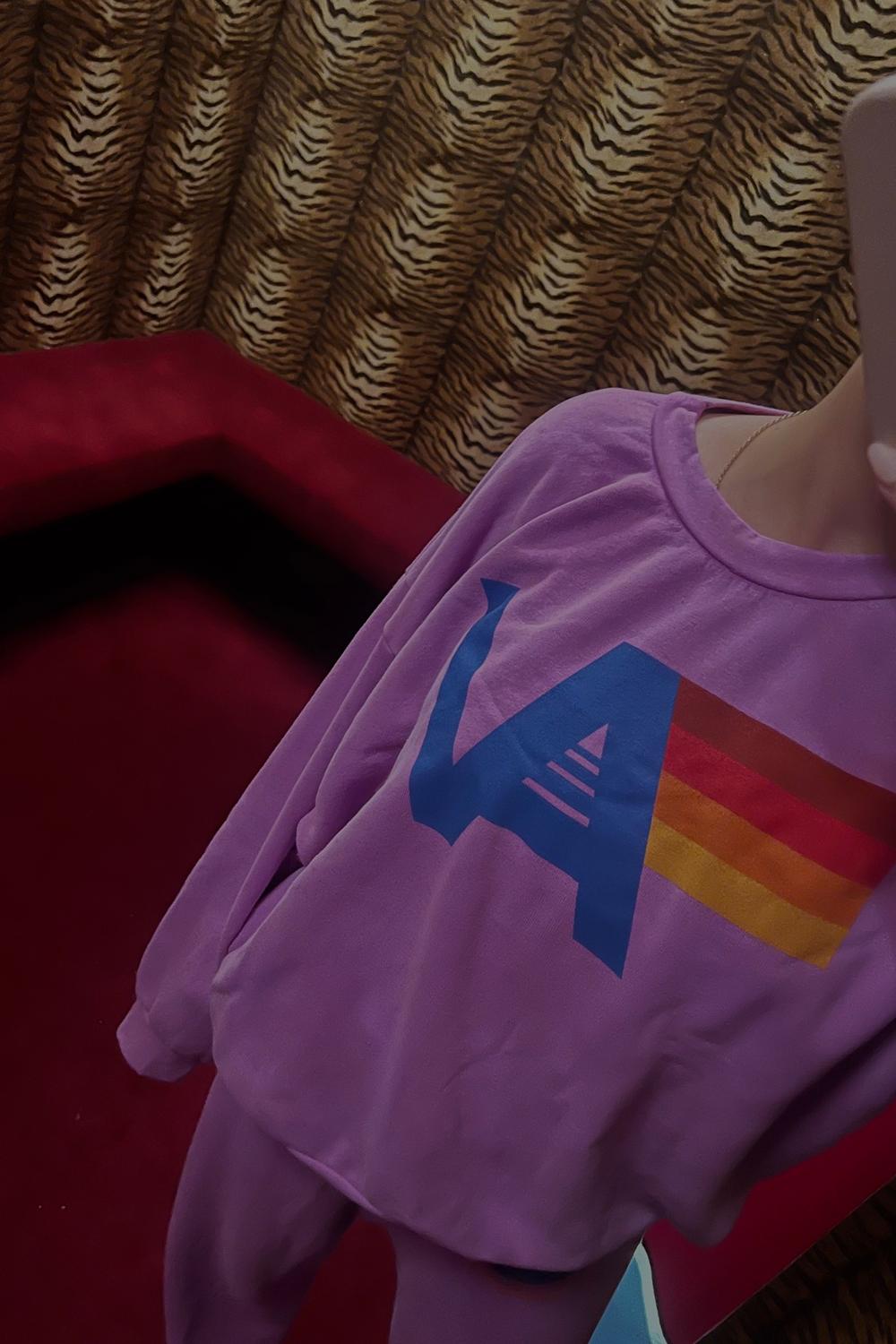 Post featuring LOGO RELAXED CREW SWEATSHIRT - NEON PURPLE