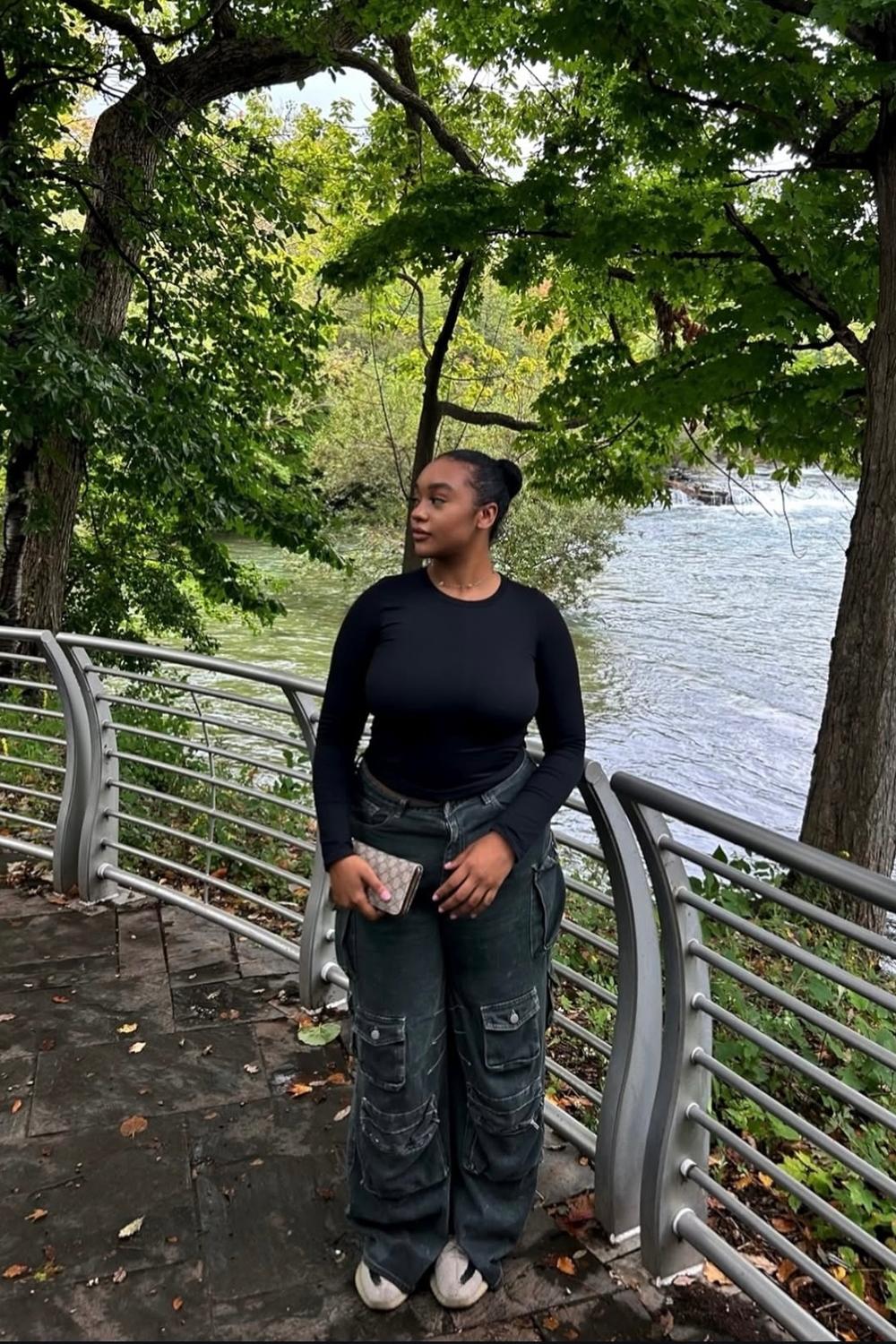 Post featuring Shapey Crew Neck Top - Black