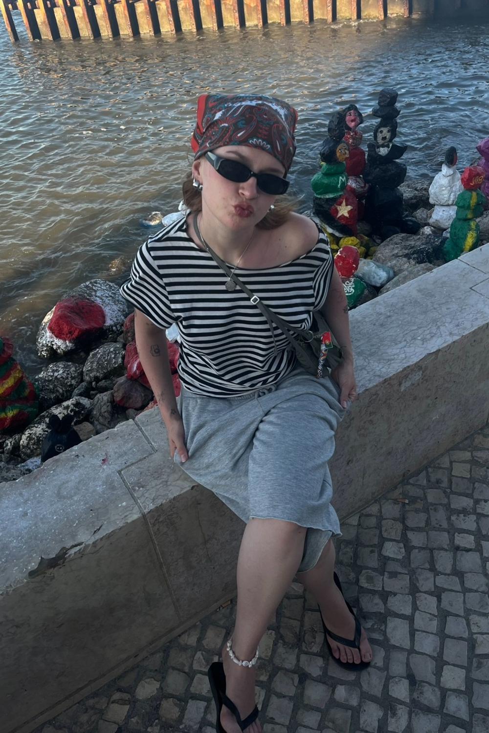 Post featuring Reclaimed Vintage slim rectangle wrap sunglasses in black-Brown