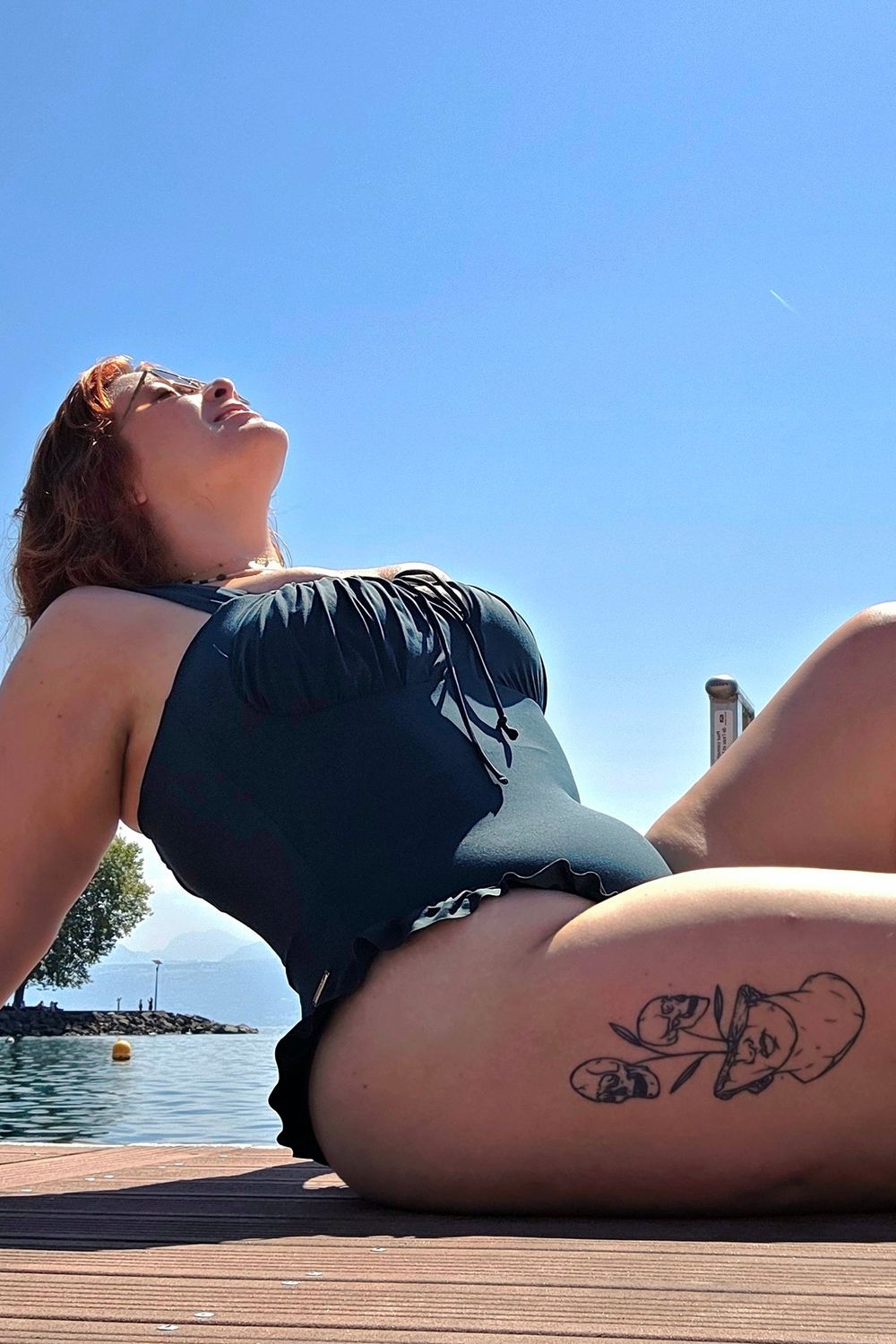 Post featuring Sea Maiden Ruffle One Piece - Dark Sea