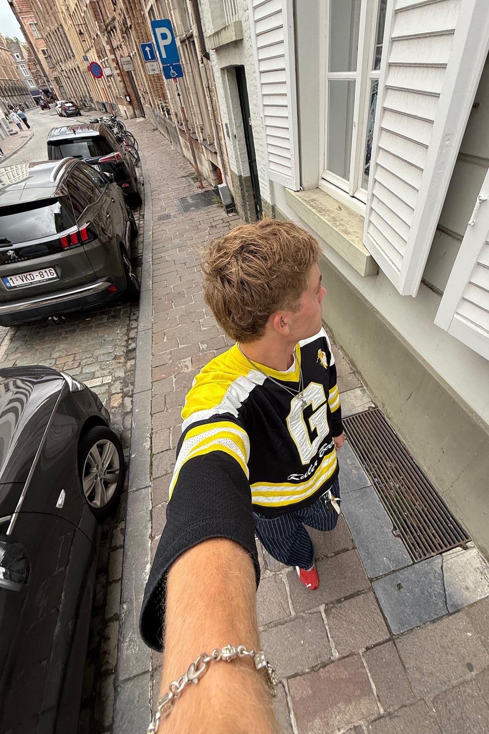 Post featuring Man. Mini Bas Relief Orb Pendant Necklace