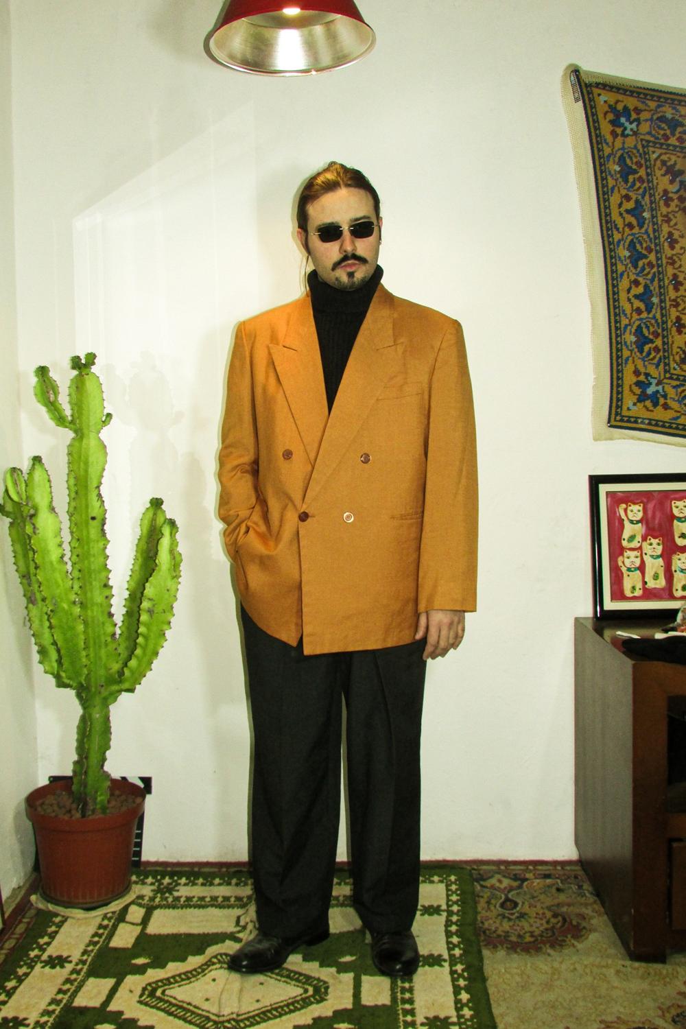 Post featuring Extra Fine Merino Wool Polo Sweater