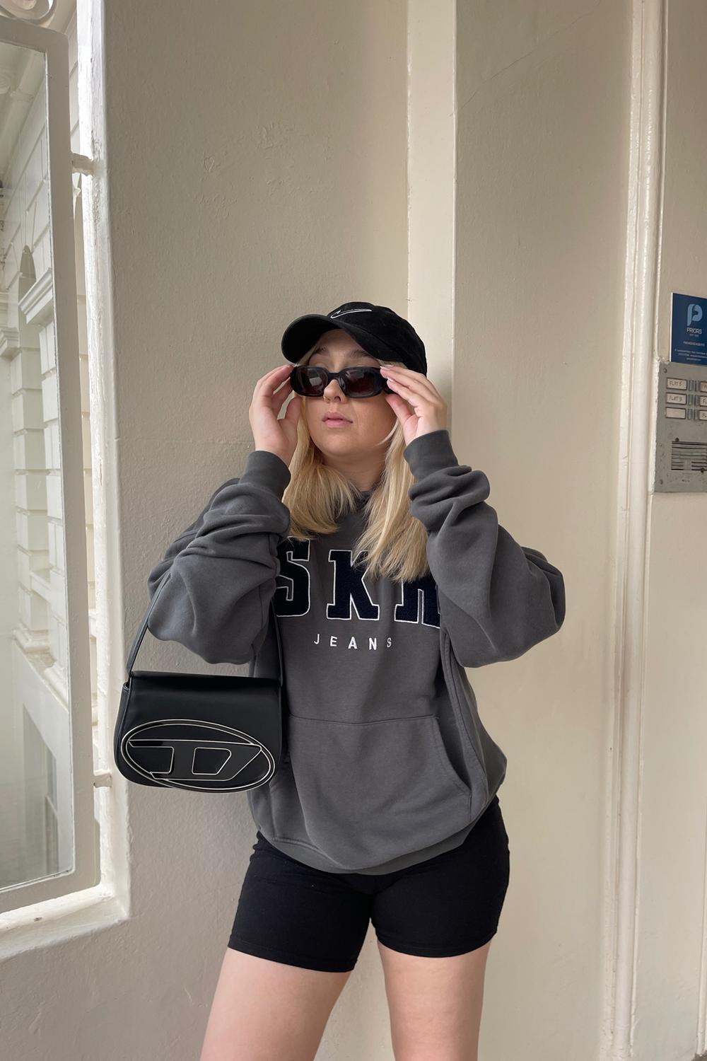 Post featuring Official SKR Logo Hoodie in Billow