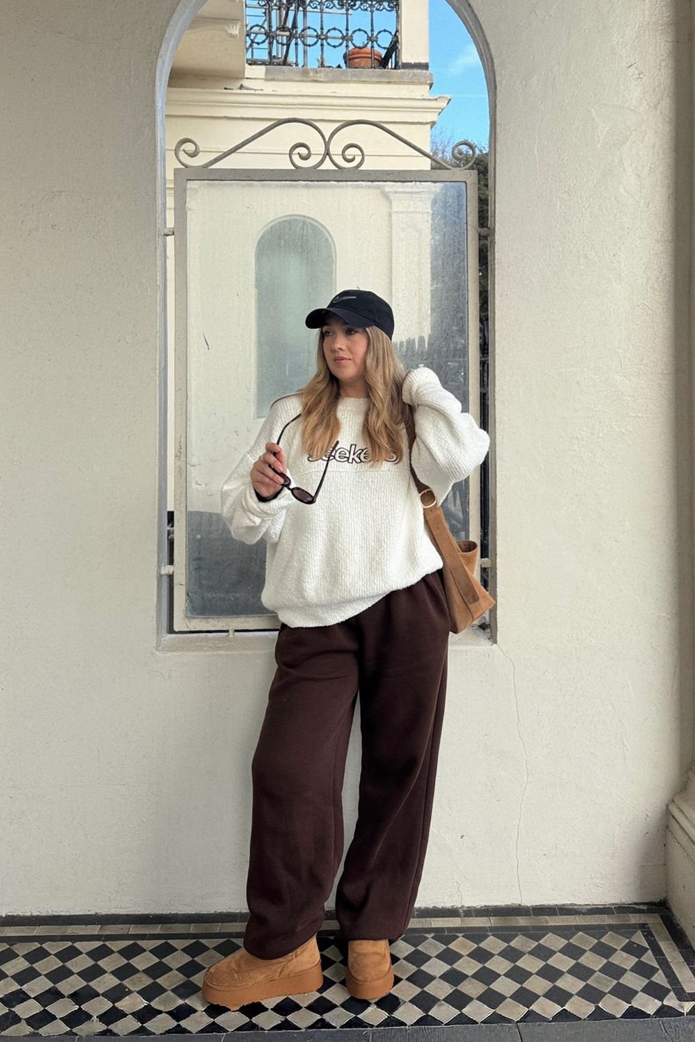 Post featuring Nonna Logo Knit Sweater