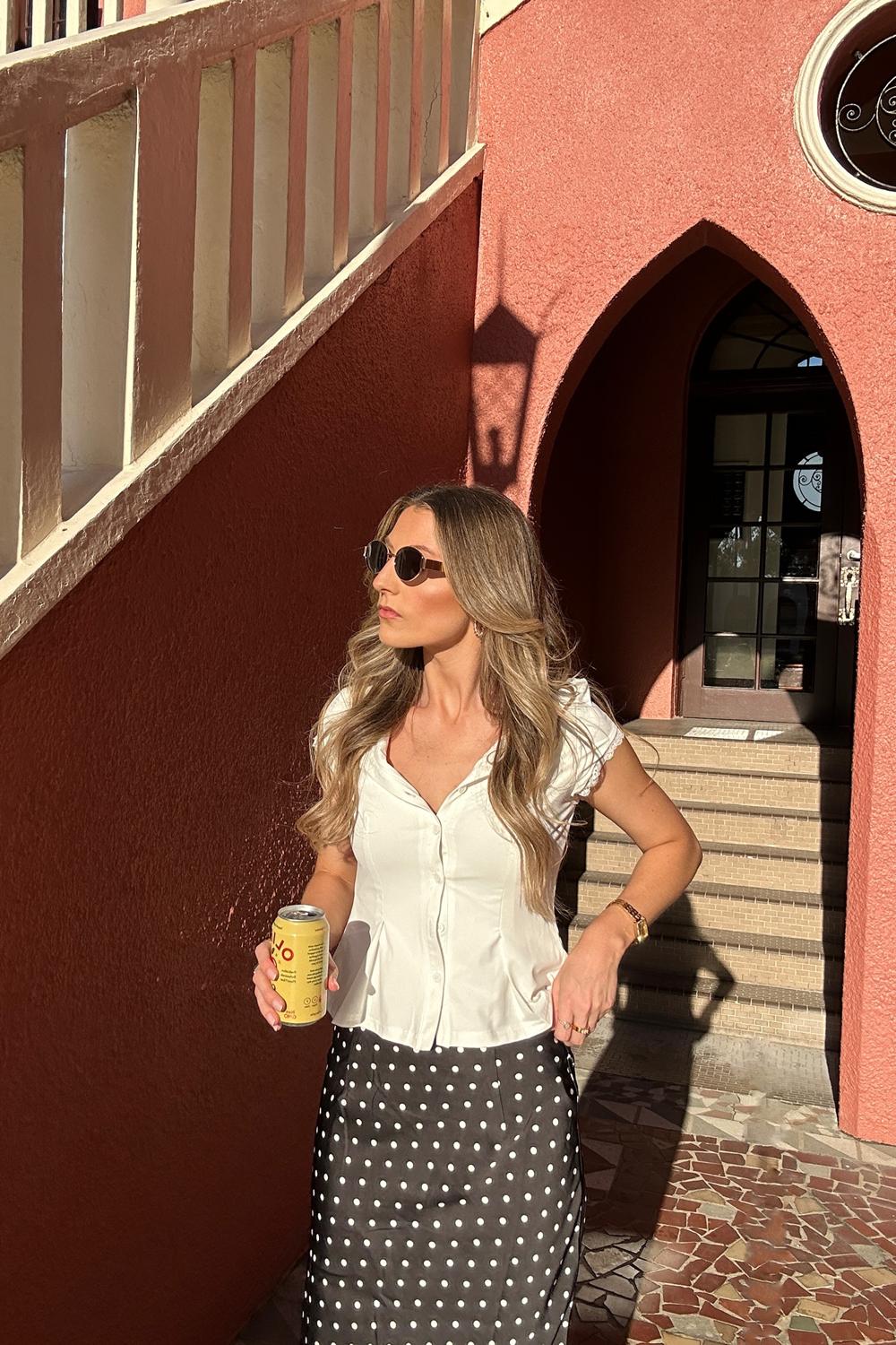 Post featuring Breanne Midi Skirt - Black Polka Dot