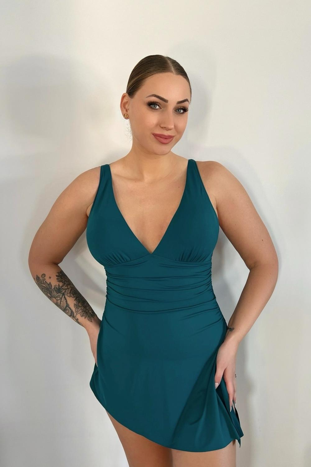 Post featuring Ruched V-Neck Side Tie Slimming Swim Dress