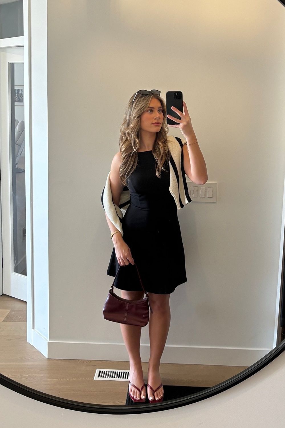 Post featuring The Black Boat Neck High Waisted Mini Dress