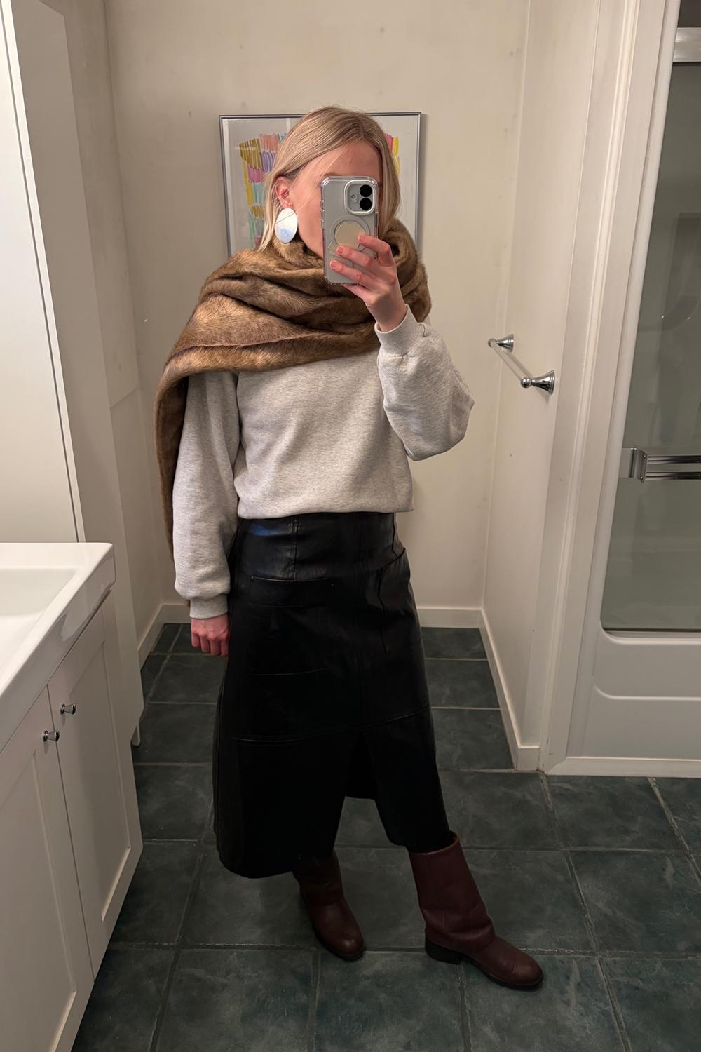 Post featuring FAUX LEATHER SKIRT - BLACK —  MIJEONG PARK - LA based womenswear label