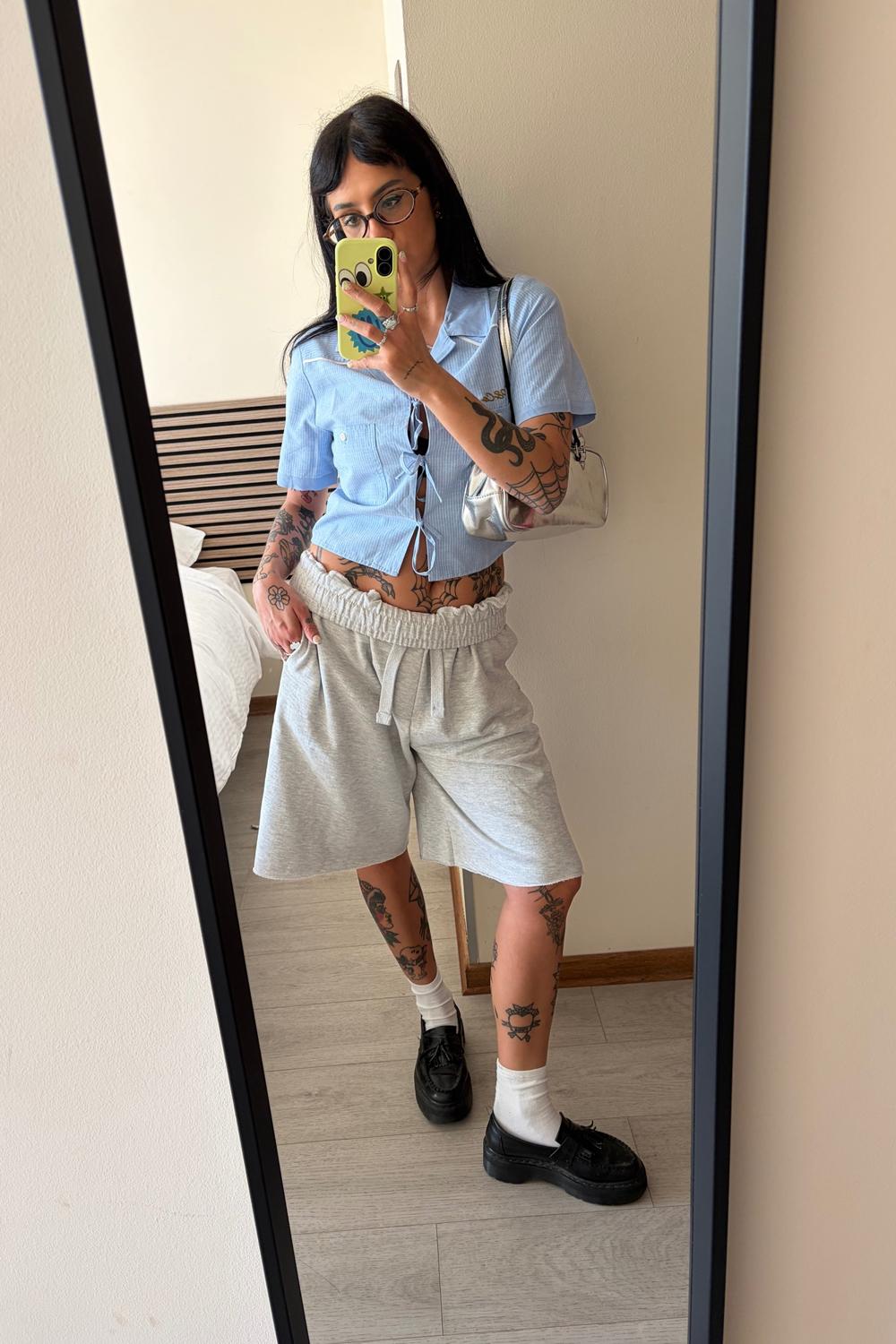 Post featuring Wildflower Bow-Tie Cropped Shirt - Blue Hickory Stripe